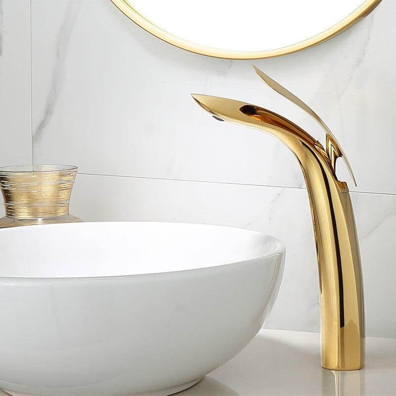 LLAVE LAVABO DORADO